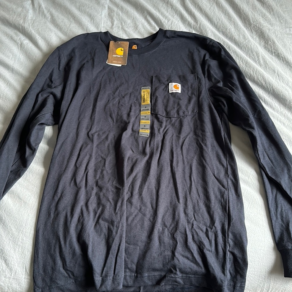 Brand new never worn Carhart longsleeve shirt with front pocket.